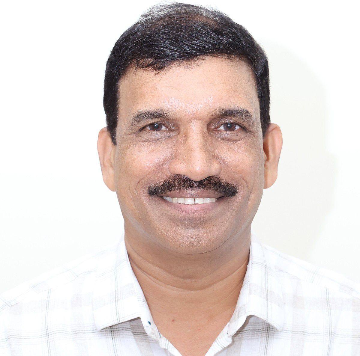 Dr. Dinesan Cheruvat, IAS